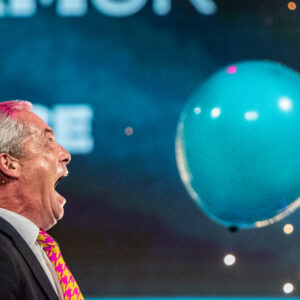 Nigel Farage enjoys Fireworks and balloons at Reform Conference : Picture: worldwidefeatures.com